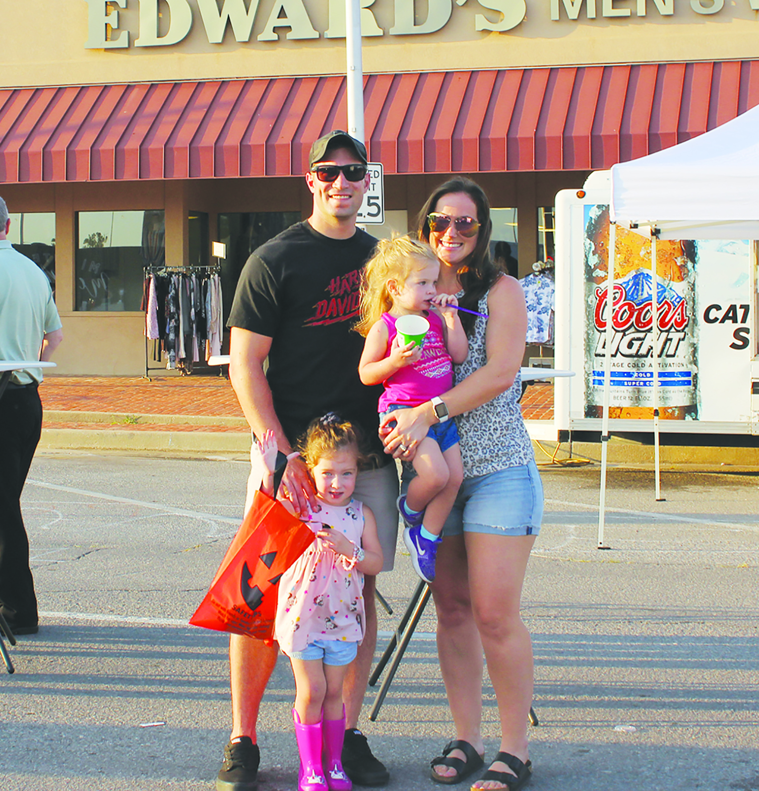 Cody, Stephanie, Lacey and Bailey Jackson stop for a quick photo between festivities. 