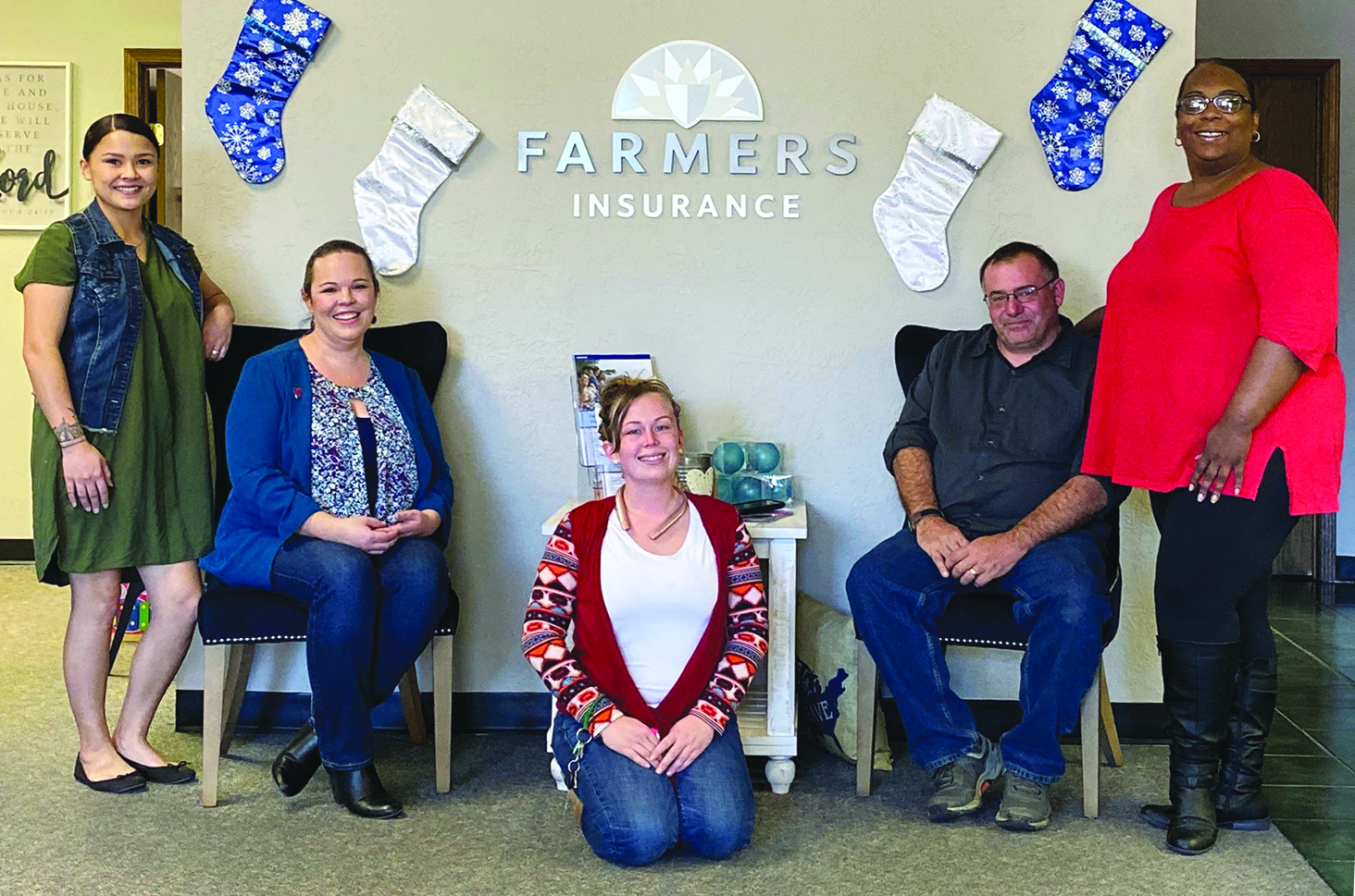 Staff members enjoy a brief break during the agency’s first anniversary open house and ribbon-cutting celebration. Guests who attended the event enjoyed hors d’oeuvres by Buffalo Grove Coffee and a photo booth set up by Enchanted Mirror. Pictured, left to right, are: Hennassey Hawes, Angela Schertle, Brittany White, Charles Schertle and Shanelle Davis. Photo: Curtis Awbery 
