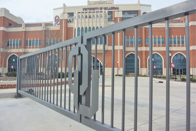 Ledger photo by Michael Duncan A gate is closed in front of the Gaylord Family-Oklahoma Memorial Stadium on the University of Okla- homa campus in Norman. OU’s flagship campus is closed due to a confirmed case of the COVID-19 coronavirus.