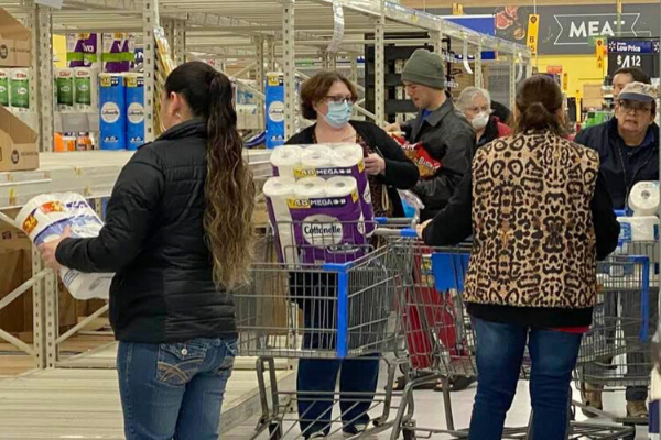 Customers rush to the toilet paper aisle at the Altus Walmart Supercenter. Ledger photo by Curtis Awbrey