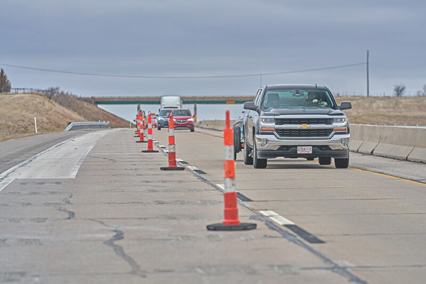 Motorists travel within a path of traffic cones on the H.E. Bailey Turnpike. Ledger photos by Chris Martin