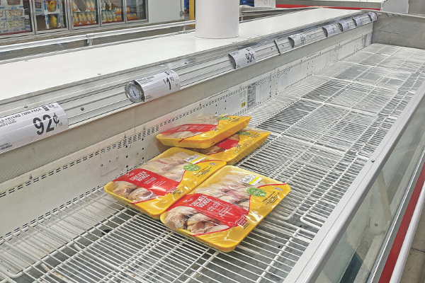 A few packages of chicken remain in a frozen display case inside the Sam’s in Lawton. Ledger photos by JJ Francais