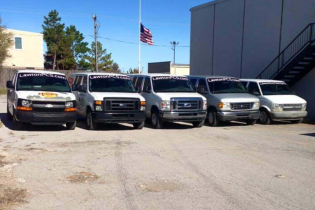 Photo provided          Vehicles parked outside Lawton Professional Cleaning Services. Lawton PCS has several subsidiaries that handle a variety of services. They use Breathe EZ Air Duct & Chimney Cleaning to disinfect businesses with their electrostatic sprayer.