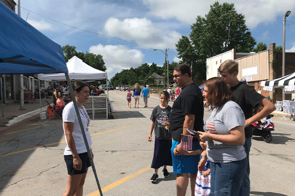 In this photo posted on the Stephanie Bice for Congress Facebook page, Bice, left, speaks with a family during a recent campaign stop in Luther.