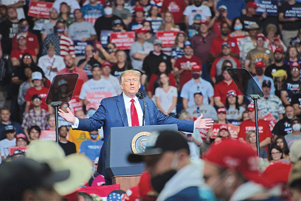 President Donald Trump speaks to a crowd during a June campaign rally at the Bank of Oklahoma Center in Tulsa.