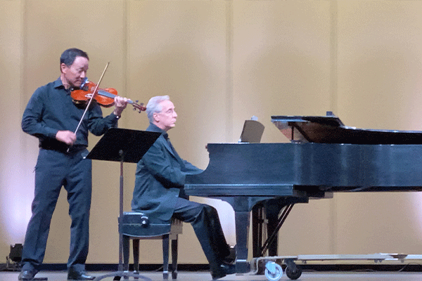 Violinist David Kim and Maestro Jon Kalbfleisch perform Vivaldi’s Four Seasons at the McMahon Auditorium. The virtual concert will be broadcast in its entirety Saturday evening on local stations, with a rebroadcast on KSWO Channel 7 Sunday evening. Ledger photo by Curtis Awbrey