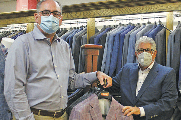 Mark Ramming and Eddie Hamra of Edward's Men's Wear, 405 S.W. C Ave. in Lawton  Ledger file photo by Curtis Awbrey