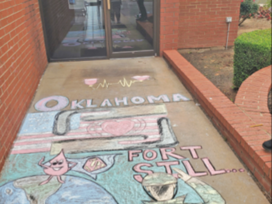The walkway leading up to the entrance of the Oklahoma Blood Institute office building in Lawton is decorated in chalk.