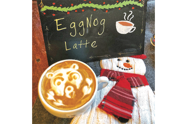 An egg nog latte is topped with seasonal foam work at Just Brew It, 106 W. Cypress St. in Altus.