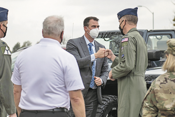 Air Force photos by Senior Airman Breanna Klemm, 97th Air Mobility Wing Public Affairs U.S. Air Force Col. Matthew Leard, 97th Air Mobility Wing commander, greets Oklahoma Gov. Kevin Stitt on March 5, 2021, at Altus Air Force Base. Altus AFB is home to the sole training units for aircrew assigned to the C-17 Globemaster III, KC-46 Pegasus and KC-135 Stratotanker