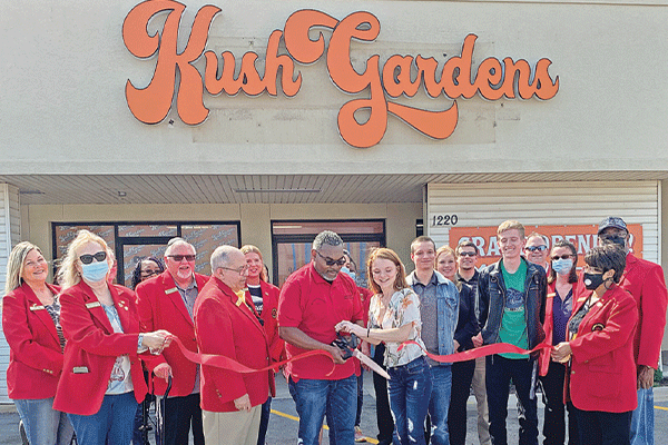 LEDGER PHOTO BY CURTIS AWBREY Redcoat Ambassadors for the Lawton-Fort Sill Chamber of Commerce met with Kush Gardens staff for a ribbon cutting to welcome the new venture into the community. Kush Gardens of Lawton, located at 1220 NW Sheridan Road, is part of the medical marijuana dispensary chain. With locations across the Sooner State, Kush Gardens focuses on each individual’s medical needs and preferences to help patients select products that will be most beneficial. \