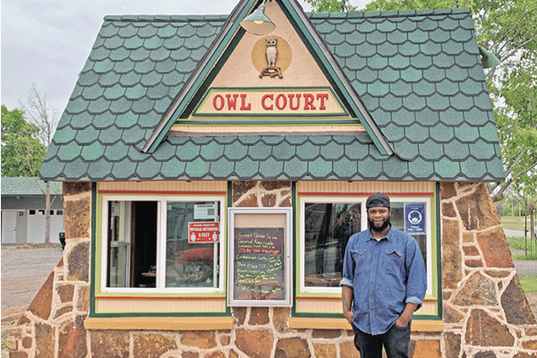 Elijah Vick stands in front of his Brew Brother Coffee shop in the renovated Owl Court office in the Old Britton area of Oklahoma City. LEDGER PHOTOS BY MIKE W. RAY 
