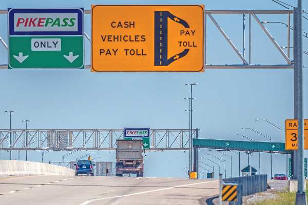 LEDGER PHOTO BY CHRIS MARTIN         Toll plazas such as this one on the H.E. Bailey toll road will become a thing of the past when “cashless tolling” is fully implemented on Oklahoma’s turnpike system.          