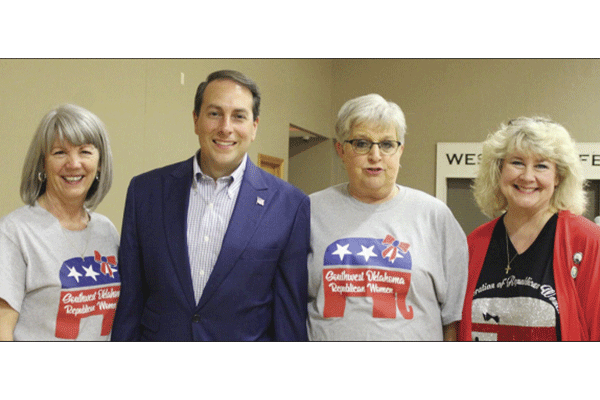 File Photos Courtesy of John Madison Clinton, Political commentator and author Tom Basile, keynote speaker at the 2020 Beans and Baskets GOP fundraiser, visits with several Republican women. Pictured are Donna Alton, Harmon County Republican chair; Basile; Deb Davis, Southwest Oklahoma Republican Women president; and Lorie Legere, state president of Oklahoma Federation of Republican Women. 
