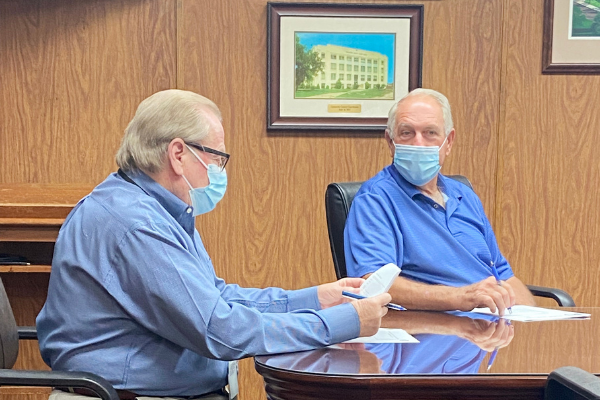 From the left, Comanche County Commissioners Johnny Owens and Gail Turner prepare for Monday's Board of Comanche County Commissioners meeting. The board granted the Pecan Valley Waterworks Association's request to organize as a rural water district. Eric Swanson/Ledger photo
