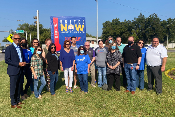 Caption: From the left, Hossein Moini, chairman of the United Way of Southwest Oklahoma’s 2021 fundraising campaign, and other United Way supporters pose for a photo Friday at Gore Meridian Park in Lawton. The United Way has set a fundraising goal of $1.25 million this year.