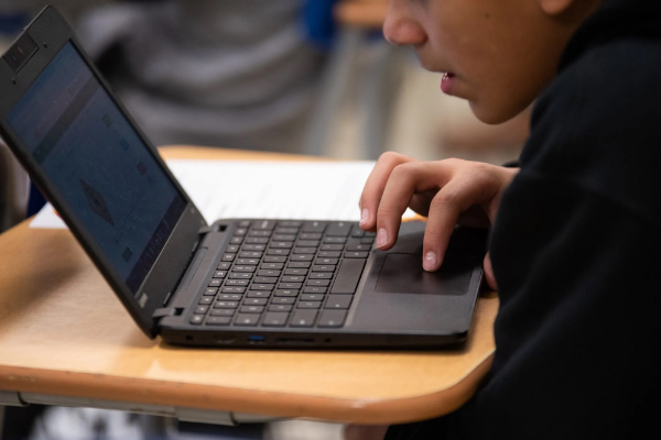 A middle school student works on a laptop computer during class at Bridge Creek Elementary School in Blanchard on Nov. 21, 2019. (Whitney Bryen/Oklahoma Watch)