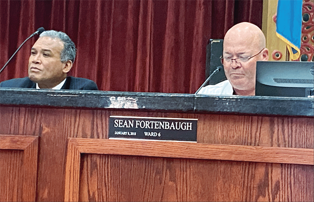 Lawton City Councilmen Allan Hampton, left, and Sean Fortenbaugh listen to a discussion during the Lawton City Council meeting's special meeting Tuesday at City Hall. 