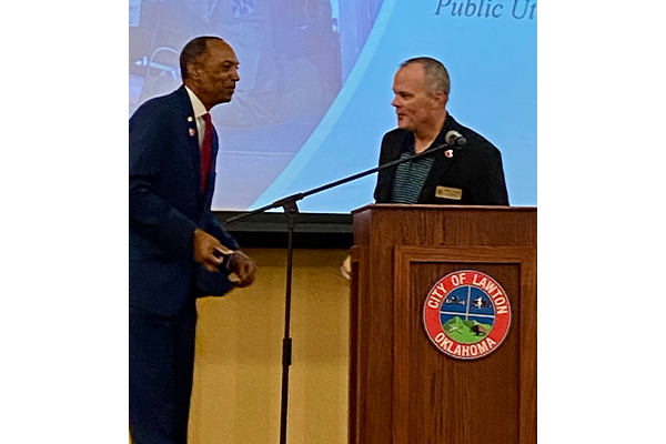 From the left: Albert Johnson Jr. greets Lawton City Manager Michael Cleghorn during a Veterans Day breakfast Nov. 11 at Lawton City Hall. A veteran of the U.S. Army, Johnson was the speaker at the city's first-ever celebration of its employees who are veterans. Eric Swanson/Ledger photo