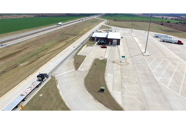 This drone photo shows the Kay County port of entry a mile south of the Kansas/Oklahoma state line.  Photo courtesy of Oklahoma Corporation Commission
