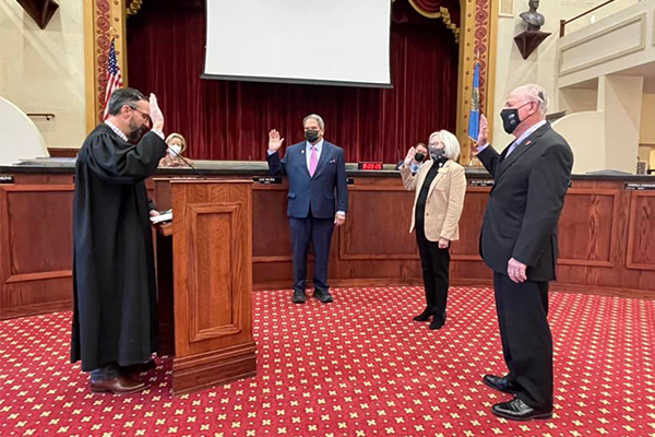 From left, Municipal Judge Nathan Johnson swears in Ward 2 Councilmember Kelly Harris, Ward 1 Councilmember Mary Ann Hankins and Mayor Stan Booker. Hankins and Booker were sworn in for their second terms, while Harris was sworn in for his first term. Kaley Patterson Dorsey/City of Lawton