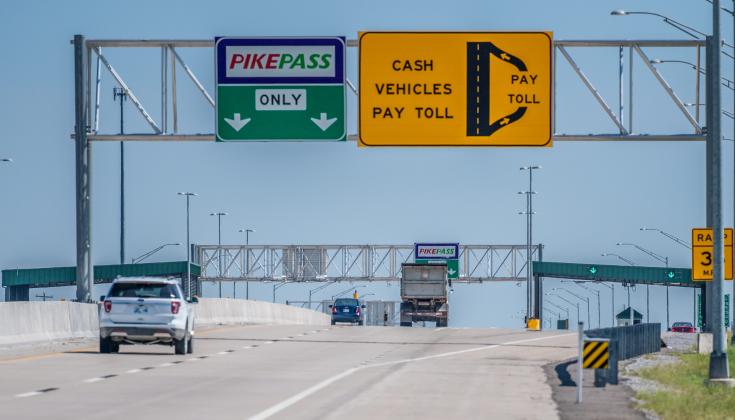 Toll payments in bills and coins, such as those made at this toll plaza near Chickasha, will be eliminated on the H.E. Bailey when the turnpike converts to totally cashless tolling this year.  CHRISTOPHER BRYAN/LEDGER PHOTO