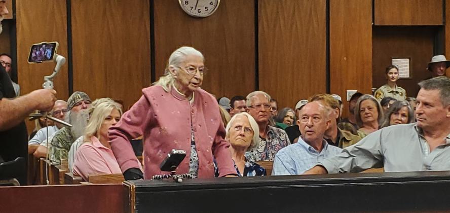 Sue Kincaid, who was born in Hochatown, speaks at Monday’s McCurtain County Board of Commissioners meeting. Kincaid’s father was the town’s postmaster for 42 years. Photo courtesy Dian Jordan.