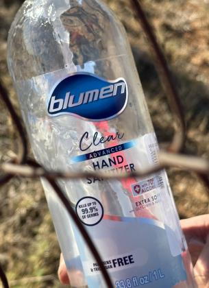 Many bottles of Blumen hand sanitizer, such as this one, were found at the site of a fire Oct. 18 in Ninnekah where Bordwine Development had stored pallets of hand sanitizer, soap and lotion. (Ledger photo by JJ Francais)