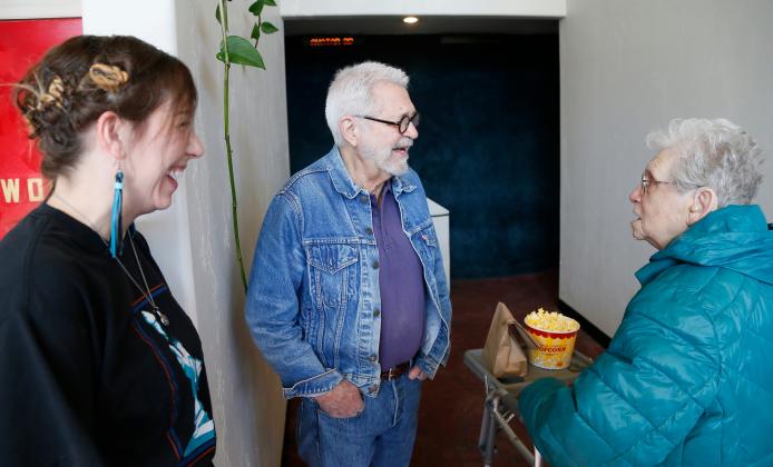 Liberty Theatre CEO Rae Smith and Owner Jerry Applewhite chat with a  patron prior to the Saturday matinee screening of Avatar. RIP STELL | SOUTHWEST LEDGER