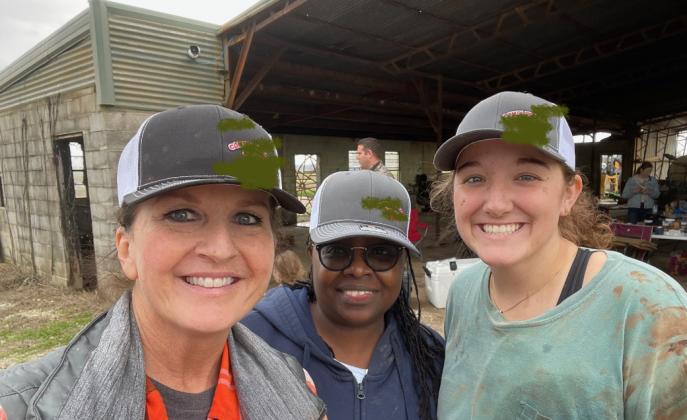 State Rep. Tammy Townley, left, and daughter Victoria, right, along with an  unidentified woman smile after surviving a helicopter crash late Saturday  afternoon. The helicopter the three women were using to hunt feral hogs crashed along the Red River. PHOTO COURTESY OF REP. TAMMY TOWNLEY
