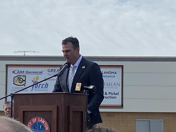 Gov. Kevin Stitt addresses the audience during a ribbon-cutting ceremony for the FISTA Innovation Park on Thursday in the Central Plaza parking lot. State and local officials flocked to the celebration of FISTA’s official opening. ERIC SWANSON | SOUTHWEST LEDGER