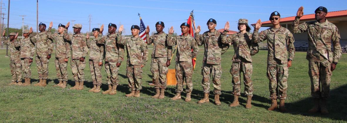 Fourteen immigrants from 12 countries who enlisted in the U.S. Army  take the oath of citizenship to become American citizens during a naturalization ceremony at Fort Sill. CHRISTINE GARDNER | FIRES CENTER OF EXCELLENCE