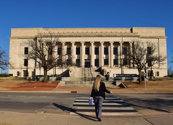A woman makes her way to the Oklahoma Judicial Center, home of the Oklahoma Supreme Court. JENNA LOWRANCE | SOUTHWEST LEDGER
