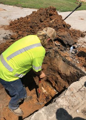 An employee of the Chickasha Public Works Department makes repairs on a broken water line. SHAE MORTIMER | CITY OF CHICKASHA