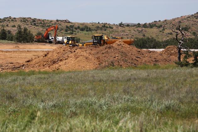 Heavy construction equipment is on site for the Wichita Mountains Wildlife Refuge project that will incorporate a new headquarters, maintenance facility and fire station. HUGH SCOTT JR. | SOUTHWEST LEDGER