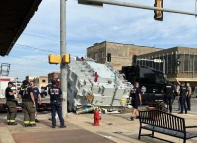 Chickasha police officers and firefighters were summoned to the scene of an errant transformer that fell off the bed of a semi-truck hauling the equipment from south Texas to Oklahoma City. CURTIS W. AWBREY | SOUTHWEST LEDGER