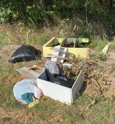 This pile of debris was found on a Comanche County road near Lawton’s landfill on Aug. 17, 2020. MIKE W. RAY | SOUTHWEST LEDGER