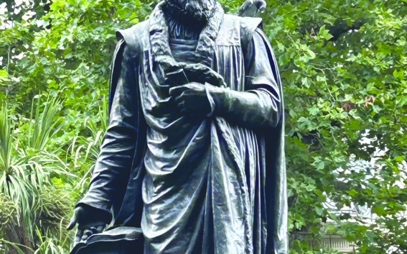 Photo by James Finck, Ph.D. This London statue of William Tyndale (circa 1495-1536) shows the English Bible publisher who would be put to death for his religious ideas.