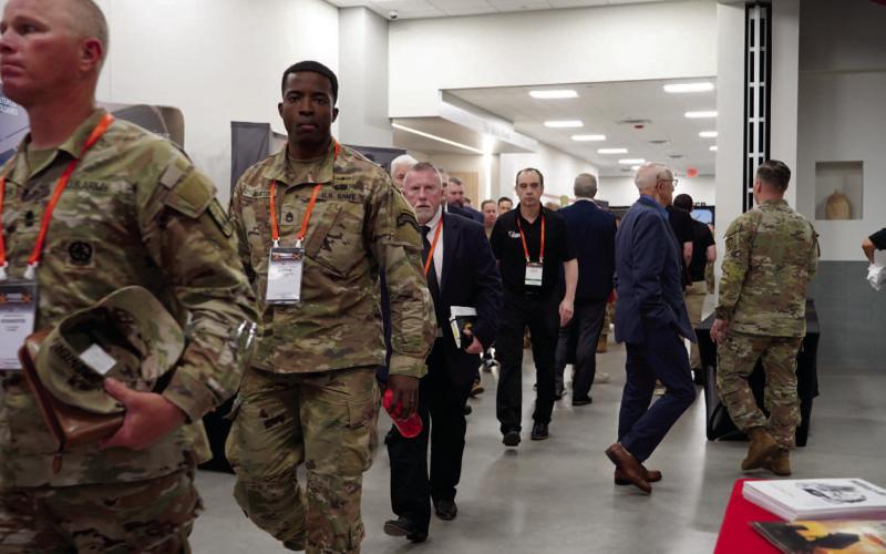 Ashley Payne | Southwest Ledger Attendees of the FIRES Symposium file down the hallway at the FISTA Innovation Park Wednesday. “It is so rewarding to see thousands of people from all over the world come to FISTA Innovation Park to experience state-of-the-art components that support national defense,” said FISTA President and CEO Dr. Krista Ratliff.