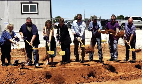City officials shoveling dirt at the water plant groundbreaking ceremony May 7 were, from left: Council Member Lisa Hatchett, Mayor Zach Grayson, Council members Erica Alexander, Georgianne Hebblethwaite, Kelly Boyd, Clark Southard and Rockey Talley, and former Mayor Chris Mosley, who played an instrumental role in efforts to build a new water treatment plant. Curtis W. Awbrey | Southwest Ledger