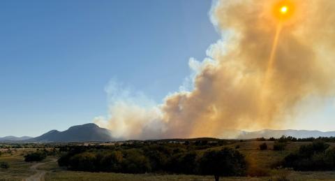 Provided A large plume of smoke blocks out the Thursday afternoon sun at the Wichita Mountains Wildlife Refuge as the Rush Fire burns more than 11,000 acres.