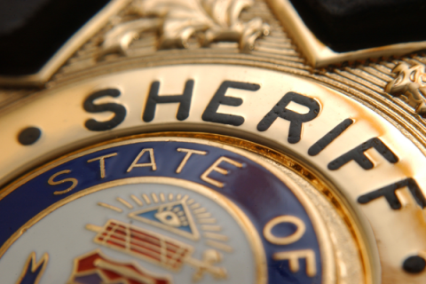  Facing an ouster proceeding, Kent Simpson resigned as Cotton County Sheriff recently, but he still must stand trial on a criminal charge arising from an indictment issued by a multi-county grand jury.