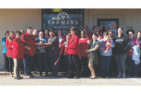 Friends, family and clients visit Farmers Insurance agent Angela Schertle’s office to celebrate the agency’s first anniversary. Ambassadors from the Lawton-Fort Sill Chamber of Commerce held a ribbon-cutting ceremony to highlight the milestone. Among the crowd pictured, left to right, are: Ambassador Rose Duckett, Chairman Thomas Abram, Farmers agent Angela Schertle, Charles Schertle, Brittany White, Sara Bivens, Shanelle Davis and Hennassey Hawes, along with clients and close friends. Photo: Curtis Awbrey