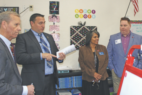 U.S. Assistant Secretary for Elementary and Secondary Education Frank Brogan, Flower Mound Public School Superintendent Dax Trent, Lawton City Council woman Onreka Johnson and the Field Representative for U.S. Congressman Tom Cole, Scott Chance, listen as Trent and others discuss Flower Mound Public School’s approach to education.