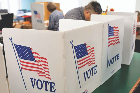 Whitney Bryen/Oklahoma Watch, file Voters cast their ballots for the 2018 general election at the McClain County Election Board in Purcell.