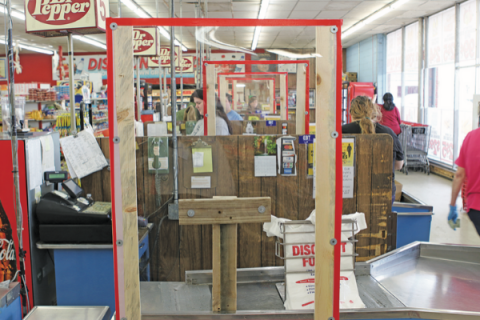 Plexiglas partitions are set up at checkout stands inside Discount Foods, 1311 SW Lee Blvd. in Lawton. Ledger photo by Jay DeSilver 