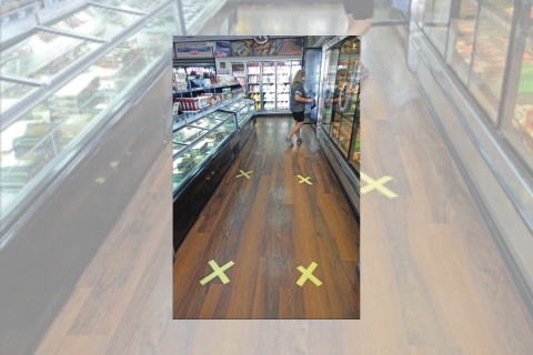 Ledger photo by Bryan M. Richter                                     Masking tape is placed at 6-foot intervals on the market floor to promote social distancing inside a Braum’s Ice Cream and Dairy Store in Moore.