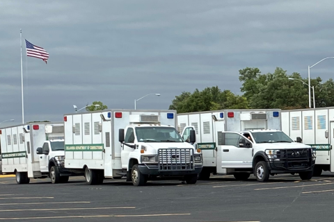 Southwest Ledger photo by Curtis Awbrey  About a dozen Oklahoma Department of Corrections vehicles were staged Wednesday in Lawton’s Central Mall parking lot adjacent to the Comanche County Detention Center. DOC transferred 70+ male inmates from the Comanche County jail to a state prison in Sayre to relieve some of the crowding in the CCDC, which has been ravaged by the coronavirus.