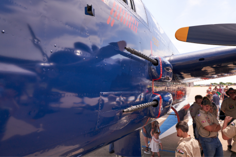 Ledger photos by Chris Martin       Patrons at last Saturday’s Wings and Wheels Fly-in and Car Show in Chickasha study the “Devil Dog” B-25.