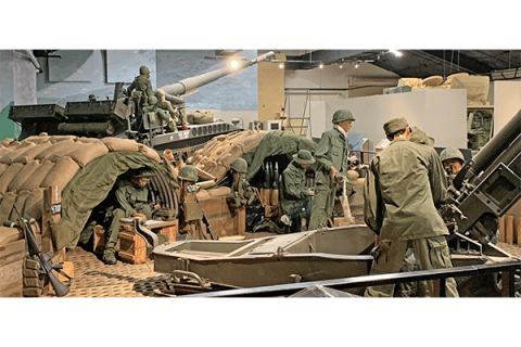 A diorama of a Vietnam War fire support base, circa 1968, with an M102 105mm Howitzer in the foreground and an M107 175mm self-propelled gun in the background, inside the Army Field Artillery Museum in Fort Sill. Ledger photos by Mike W. Ray